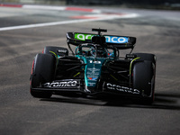 Lance Stroll of Aston Martin F1 Team AMR24 competes during the Formula 1 Singapore Grand Prix 2024 on the Marina Bay Circuit in Singapore, f...