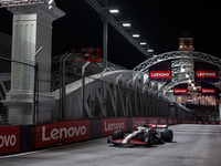 Kevin Magnussen of Haas F1 Team VF-24 Ferrari competes during the Formula 1 Singapore Grand Prix 2024 on the Marina Bay Circuit in Singapore...