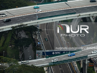 Lance Stroll of Aston Martin F1 Team AMR24 competes during the Formula 1 Singapore Grand Prix 2024 on the Marina Bay Circuit in Singapore, f...