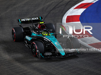 Lewis Hamilton of the Mercedes AMG F1 Team W15 competes during the Formula 1 Singapore Grand Prix 2024 on the Marina Bay Circuit in Singapor...