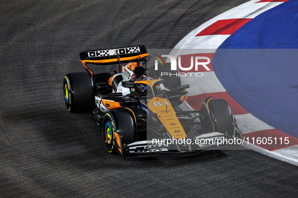 Oscar Piastri of the McLaren F1 Team MCL38 participates in the Formula 1 Singapore Grand Prix 2024 on the Marina Bay Circuit in Singapore fr...