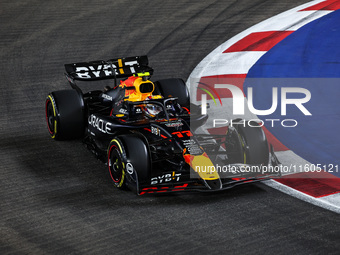 Sergio Perez of Red Bull Racing RB20 competes during the Formula 1 Singapore Grand Prix 2024 on the Marina Bay Circuit in Singapore, from Se...