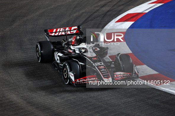 Kevin Magnussen of Haas F1 Team VF-24 Ferrari competes during the Formula 1 Singapore Grand Prix 2024 on the Marina Bay Circuit in Singapore...