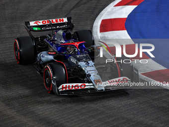 Daniel Ricciardo of Visa Cash App RB F1 Team VCARB 01 is in action during the Formula 1 Singapore Grand Prix 2024 on the Marina Bay Circuit,...