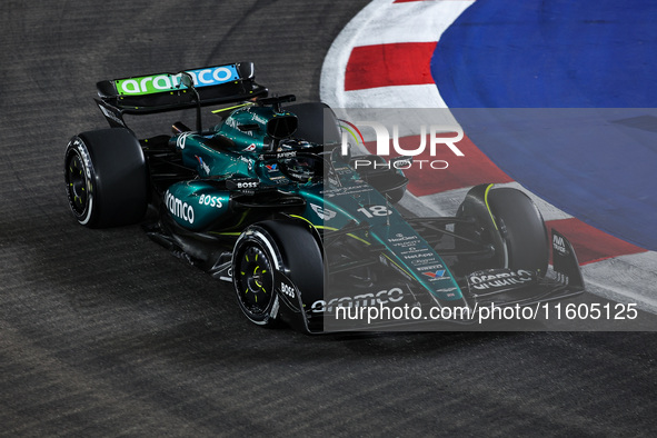 Lance Stroll of Aston Martin F1 Team AMR24 competes during the Formula 1 Singapore Grand Prix 2024 on the Marina Bay Circuit in Singapore, f...