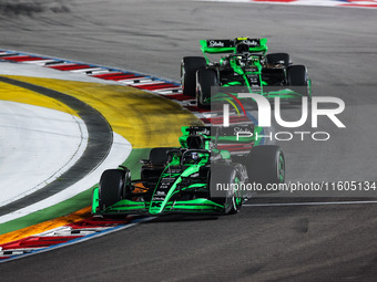 Valtteri Bottas of Stake F1 Team drives the Sauber C44, and Guanyu Zhou of Stake F1 Team drives the Sauber C44 during the Formula 1 Singapor...