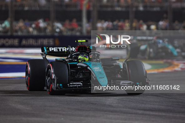 Lewis Hamilton of the Mercedes AMG F1 Team W15 competes during the Formula 1 Singapore Grand Prix 2024 on the Marina Bay Circuit in Singapor...