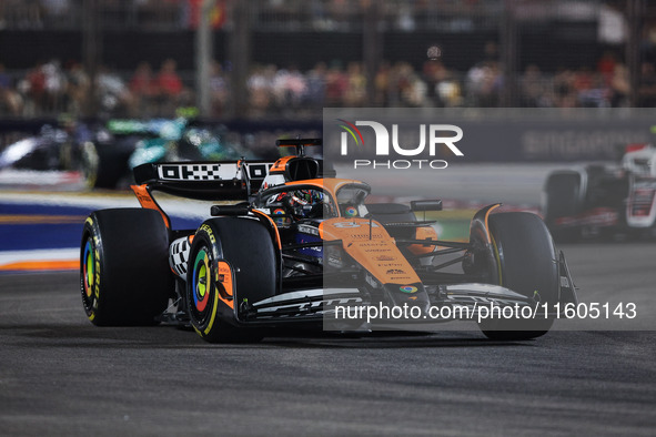 Oscar Piastri of the McLaren F1 Team MCL38 participates in the Formula 1 Singapore Grand Prix 2024 on the Marina Bay Circuit in Singapore fr...