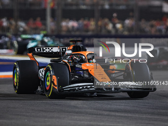 Oscar Piastri of the McLaren F1 Team MCL38 participates in the Formula 1 Singapore Grand Prix 2024 on the Marina Bay Circuit in Singapore fr...