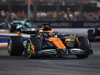 Oscar Piastri of the McLaren F1 Team MCL38 participates in the Formula 1 Singapore Grand Prix 2024 on the Marina Bay Circuit in Singapore fr...