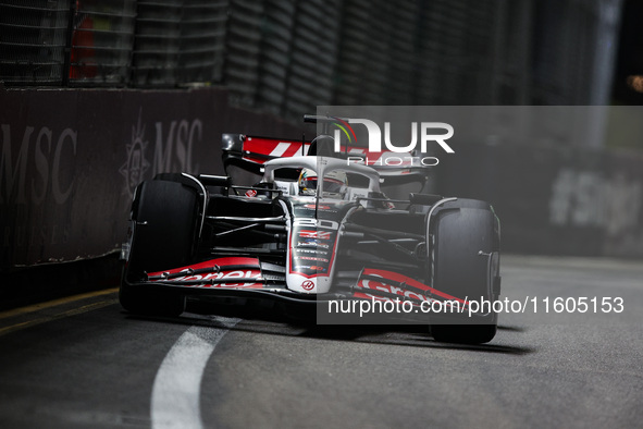 Kevin Magnussen of Haas F1 Team VF-24 Ferrari competes during the Formula 1 Singapore Grand Prix 2024 on the Marina Bay Circuit in Singapore...