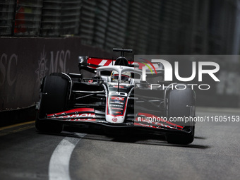 Kevin Magnussen of Haas F1 Team VF-24 Ferrari competes during the Formula 1 Singapore Grand Prix 2024 on the Marina Bay Circuit in Singapore...