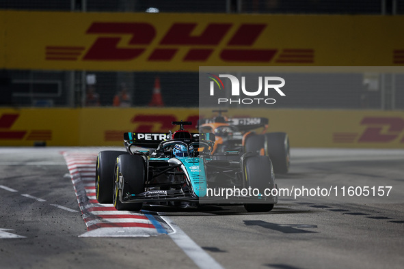 George Russell of the Mercedes AMG F1 Team W15 competes during the Formula 1 Singapore Grand Prix 2024 on the Marina Bay Circuit in Singapor...