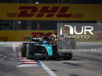 George Russell of the Mercedes AMG F1 Team W15 competes during the Formula 1 Singapore Grand Prix 2024 on the Marina Bay Circuit in Singapor...