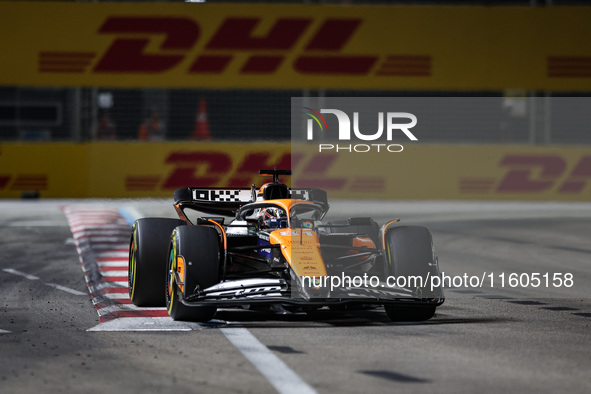 Oscar Piastri of the McLaren F1 Team MCL38 participates in the Formula 1 Singapore Grand Prix 2024 on the Marina Bay Circuit in Singapore fr...