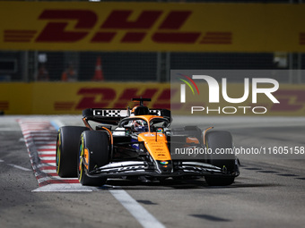 Oscar Piastri of the McLaren F1 Team MCL38 participates in the Formula 1 Singapore Grand Prix 2024 on the Marina Bay Circuit in Singapore fr...