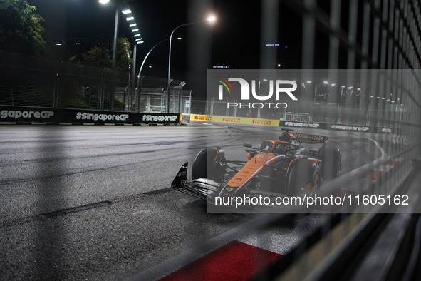 Oscar Piastri of the McLaren F1 Team MCL38 participates in the Formula 1 Singapore Grand Prix 2024 on the Marina Bay Circuit in Singapore fr...