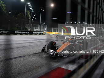 Oscar Piastri of the McLaren F1 Team MCL38 participates in the Formula 1 Singapore Grand Prix 2024 on the Marina Bay Circuit in Singapore fr...