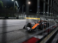 Oscar Piastri of the McLaren F1 Team MCL38 participates in the Formula 1 Singapore Grand Prix 2024 on the Marina Bay Circuit in Singapore fr...