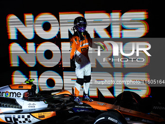 Lando Norris of the McLaren F1 Team celebrates his victory during the Formula 1 Singapore Grand Prix on the Marina Bay Circuit in Singapore,...