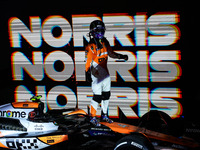 Lando Norris of the McLaren F1 Team celebrates his victory during the Formula 1 Singapore Grand Prix on the Marina Bay Circuit in Singapore,...