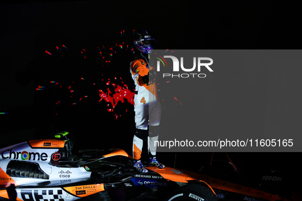 Lando Norris of the McLaren F1 Team celebrates his victory during the Formula 1 Singapore Grand Prix on the Marina Bay Circuit in Singapore,...