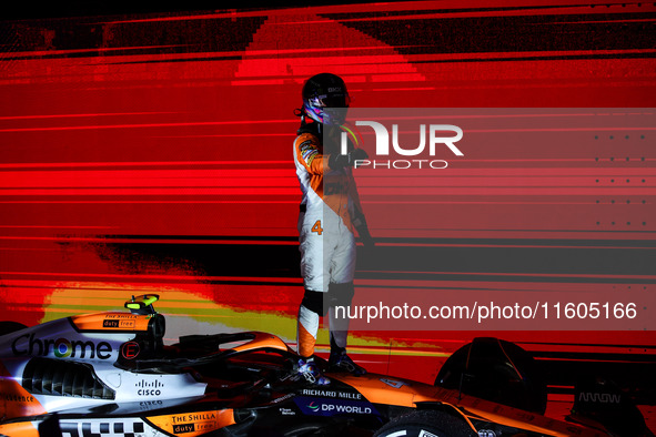 Lando Norris of the McLaren F1 Team celebrates his victory during the Formula 1 Singapore Grand Prix on the Marina Bay Circuit in Singapore,...