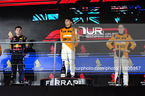 Lando Norris of McLaren F1 Team MCL38, Max Verstappen of Red Bull Racing RB20, and Oscar Piastri of McLaren F1 Team MCL38, during the Formul...