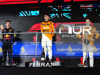 Lando Norris of McLaren F1 Team MCL38, Max Verstappen of Red Bull Racing RB20, and Oscar Piastri of McLaren F1 Team MCL38, during the Formul...