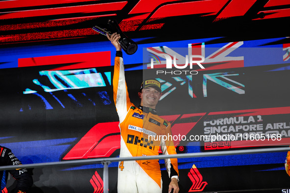 Lando Norris of the McLaren F1 Team celebrates his victory during the Formula 1 Singapore Grand Prix on the Marina Bay Circuit in Singapore,...