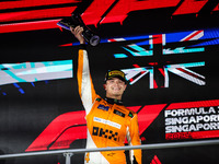 Lando Norris of the McLaren F1 Team celebrates his victory during the Formula 1 Singapore Grand Prix on the Marina Bay Circuit in Singapore,...