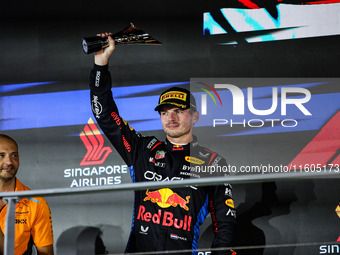 Max Verstappen of Red Bull Racing RB20 celebrates his podium during the Formula 1 Singapore Grand Prix 2024 on the Marina Bay Circuit in Sin...