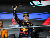 Max Verstappen of Red Bull Racing RB20 celebrates his podium during the Formula 1 Singapore Grand Prix 2024 on the Marina Bay Circuit in Sin...