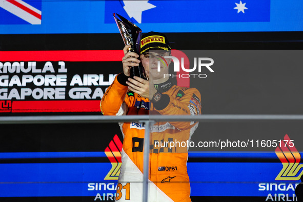 Oscar Piastri of McLaren F1 Team MCL38 celebrates his podium during the Formula 1 Singapore Grand Prix 2024 on the Marina Bay Circuit in Sin...