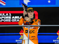 Oscar Piastri of McLaren F1 Team MCL38 celebrates his podium during the Formula 1 Singapore Grand Prix 2024 on the Marina Bay Circuit in Sin...