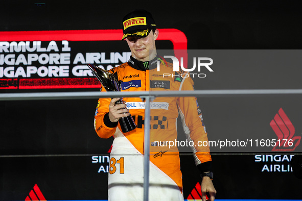 Oscar Piastri of McLaren F1 Team MCL38 celebrates his podium during the Formula 1 Singapore Grand Prix 2024 on the Marina Bay Circuit in Sin...