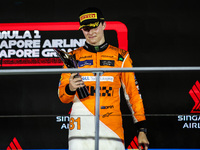 Oscar Piastri of McLaren F1 Team MCL38 celebrates his podium during the Formula 1 Singapore Grand Prix 2024 on the Marina Bay Circuit in Sin...