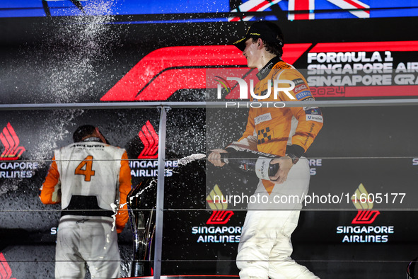 Oscar Piastri of McLaren F1 Team MCL38 celebrates his podium during the Formula 1 Singapore Grand Prix 2024 on the Marina Bay Circuit in Sin...