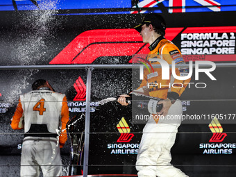 Oscar Piastri of McLaren F1 Team MCL38 celebrates his podium during the Formula 1 Singapore Grand Prix 2024 on the Marina Bay Circuit in Sin...