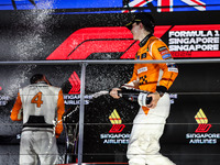 Oscar Piastri of McLaren F1 Team MCL38 celebrates his podium during the Formula 1 Singapore Grand Prix 2024 on the Marina Bay Circuit in Sin...