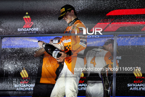 Oscar Piastri of McLaren F1 Team MCL38 celebrates his podium during the Formula 1 Singapore Grand Prix 2024 on the Marina Bay Circuit in Sin...