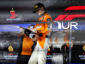 Oscar Piastri of McLaren F1 Team MCL38 celebrates his podium during the Formula 1 Singapore Grand Prix 2024 on the Marina Bay Circuit in Sin...