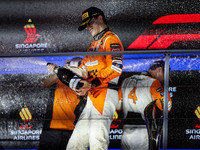 Oscar Piastri of McLaren F1 Team MCL38 celebrates his podium during the Formula 1 Singapore Grand Prix 2024 on the Marina Bay Circuit in Sin...