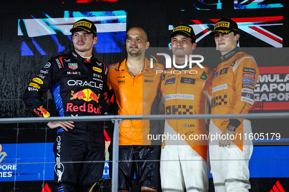 Max Verstappen of Red Bull Racing RB20, Lando Norris of McLaren F1 Team, and Oscar Piastri of McLaren F1 Team during the Formula 1 Singapore...