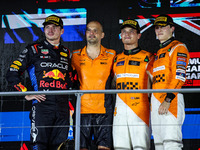 Max Verstappen of Red Bull Racing RB20, Lando Norris of McLaren F1 Team, and Oscar Piastri of McLaren F1 Team during the Formula 1 Singapore...