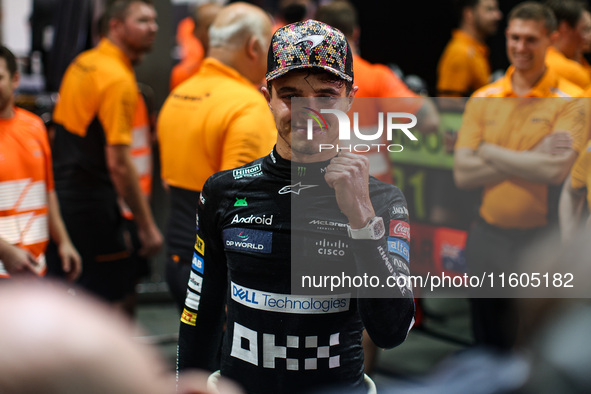 Lando Norris of the McLaren F1 Team celebrates his victory during the Formula 1 Singapore Grand Prix on the Marina Bay Circuit in Singapore,...