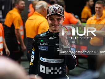 Lando Norris of the McLaren F1 Team celebrates his victory during the Formula 1 Singapore Grand Prix on the Marina Bay Circuit in Singapore,...