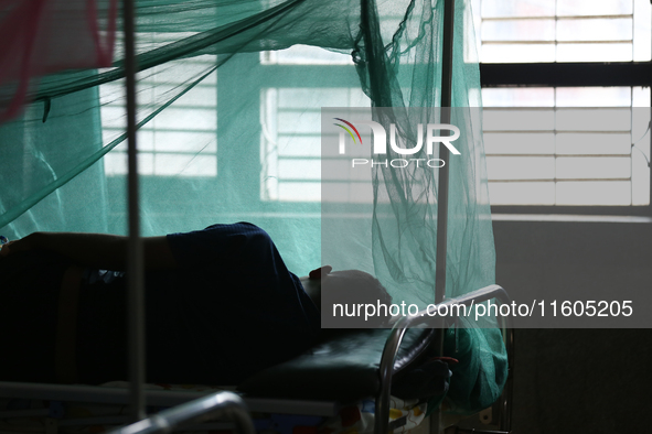 A dengue-infected patient undergoes treatment at Sukraraj Tropical and Infectious Disease Hospital in Kathmandu, Nepal, on September 24, 202...