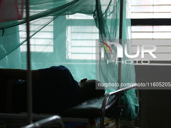 A dengue-infected patient undergoes treatment at Sukraraj Tropical and Infectious Disease Hospital in Kathmandu, Nepal, on September 24, 202...