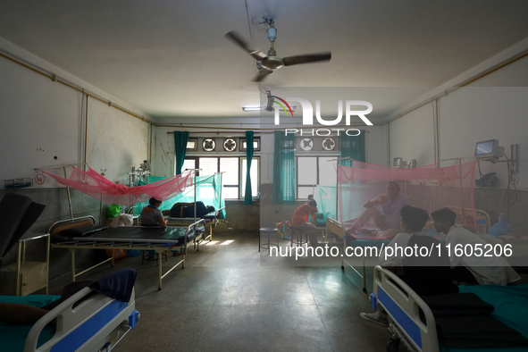 Dengue-infected patients undergo treatment at Sukraraj Tropical and Infectious Disease Hospital in Kathmandu, Nepal, on September 24, 2024,...